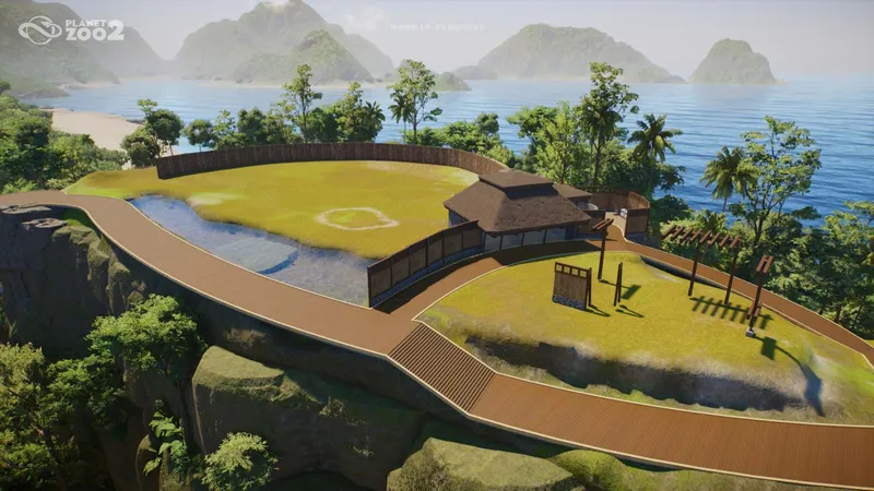 A landscaped Planet Zoo 2 habitat with a curved path, raised terrain, and planted scenery